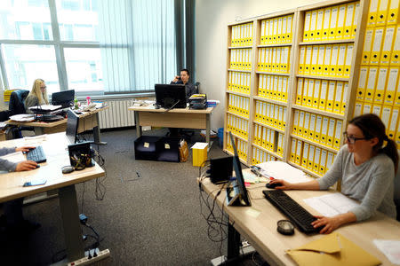 Marino Rescek (C) is seen working in his office next to his employees in Zagreb, Croatia, May 20, 2016. REUTERS/Antonio Bronic