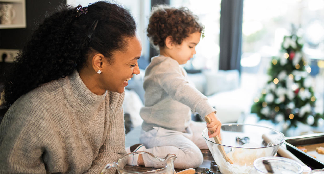 Stir-up Sunday, mother and child mixing cake. (Getty Images)