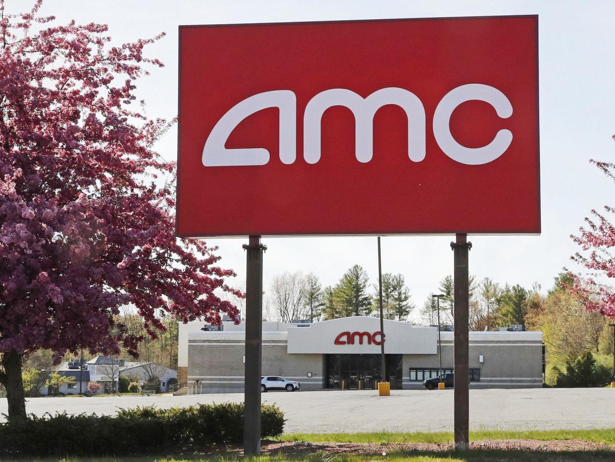 A AMC sign at a nearly empty parking lot for the theatre: (2020 The Associated Press)