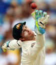 Australian cricket team wicketkeeper Matthew Wade fields a ball during the first day of the first-of-three Test matches between Australia and West Indies at the Kensington Oval stadium in Bridgetown on April 7, 2012. West Indies have scored 60/1 at lunch. AFP PHOTO/Jewel Samad (Photo credit should read JEWEL SAMAD/AFP/Getty Images)