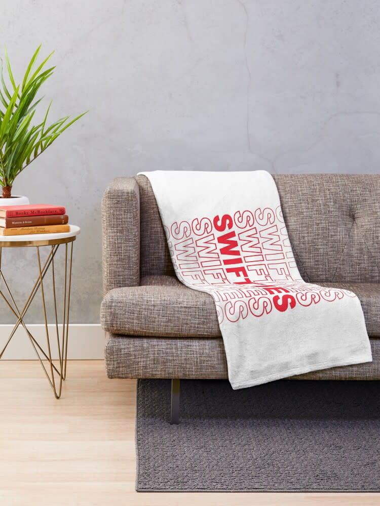 <p><a href="https://go.redirectingat.com?id=74968X1596630&url=https%3A%2F%2Fwww.redbubble.com%2Fi%2Fthrow-blanket%2FTaylor-Swift-Swifties-Name-Typography-Red-by-swiftpublic%2F105612561.16D0B&sref=https%3A%2F%2Fwww.goodhousekeeping.com%2Fholidays%2Fchristmas-ideas%2Fg45433597%2Fbest-taylor-swift-gifts%2F" rel="nofollow noopener" target="_blank" data-ylk="slk:Shop Now;elm:context_link;itc:0;sec:content-canvas" class="link ">Shop Now</a></p><p>Swifties Red Throw Blanket</p><p>redbubble.com</p><p>$41.48</p><span class="copyright">Redbubble @Swiftpublic</span>