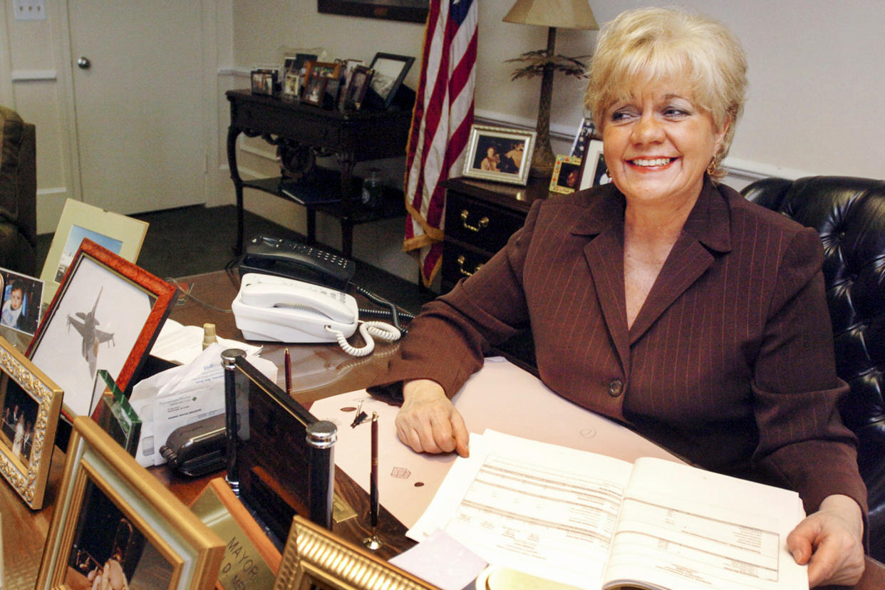 Mayor Susan Menard of Woonsocket, R.I., at her desk at City Hall on Oct. 19, 2005. (Steve Szydlowski / The Providence Journal via AP file)