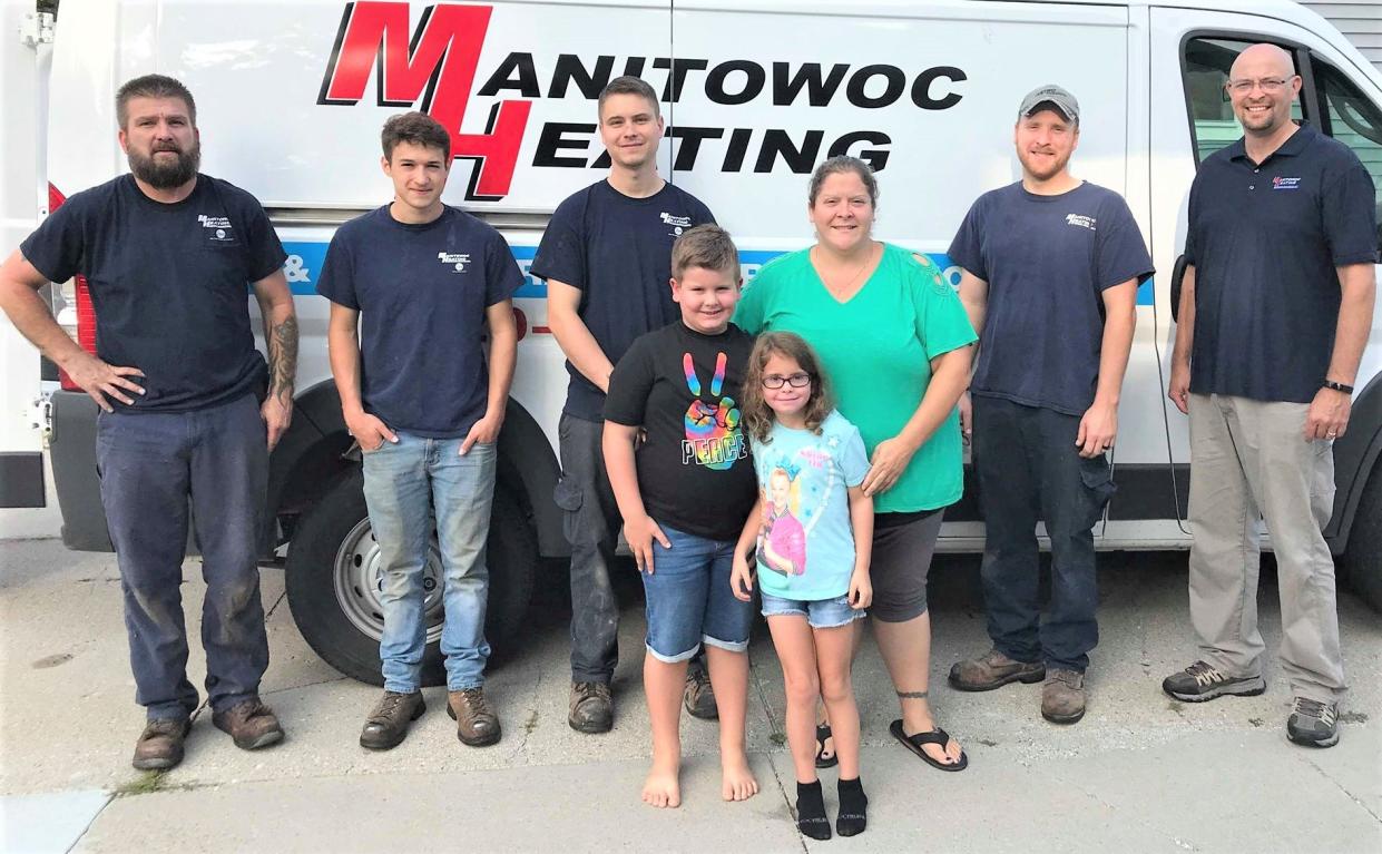 FILE - Alison Backus won a free furnace during a previous Manitowoc Heating 'Bringing the Heat' event.