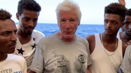 Hollywood star Richard Gere boarded a migrants rescue ship to keep a spotlight on the 121 stranded migrants