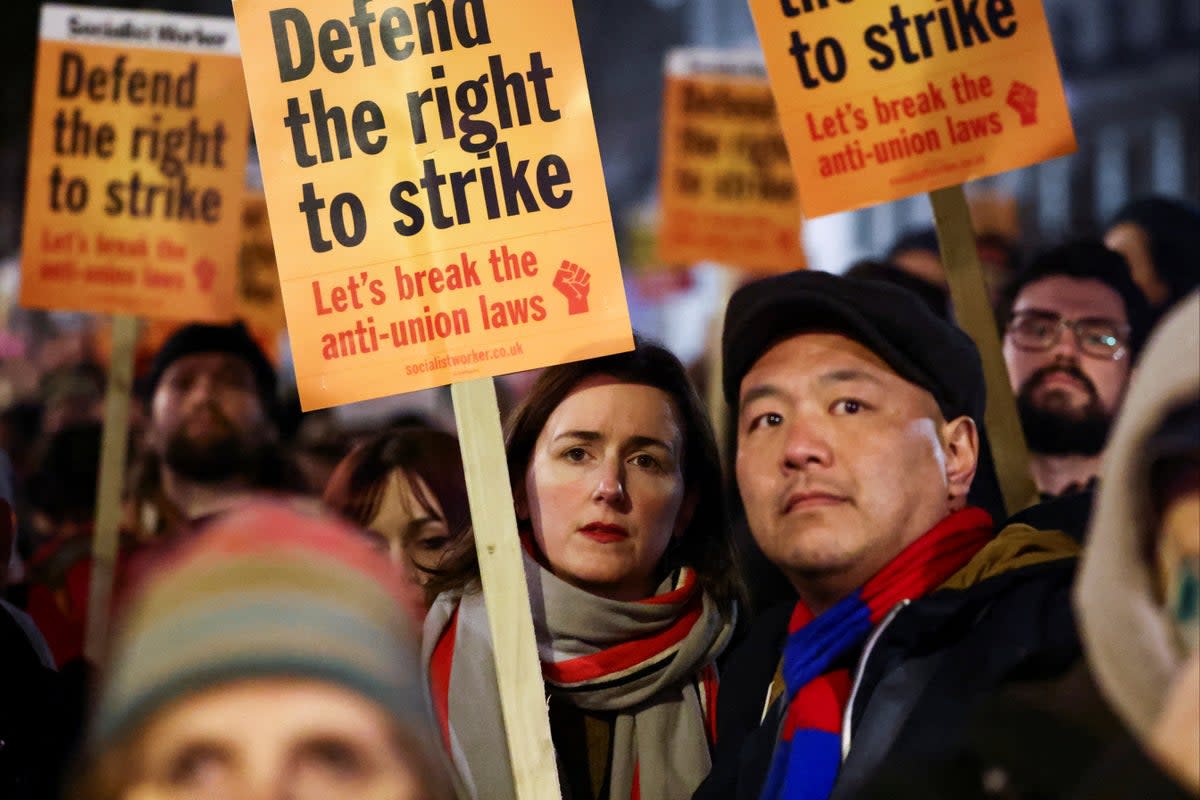 Trade Unions protest outside Downing Street  on Monday over the right to strike  (REUTERS)