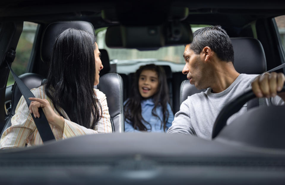 A family driving in the car together