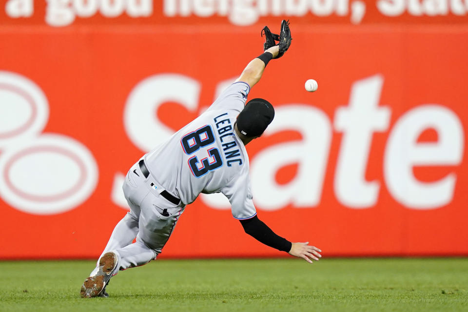 Miami Marlins second baseman Charles Leblanc cannot catch a single by Philadelphia Phillies' Matt Vierling during the seventh inning of a baseball game, Wednesday, Sept. 7, 2022, in Philadelphia. (AP Photo/Matt Slocum)