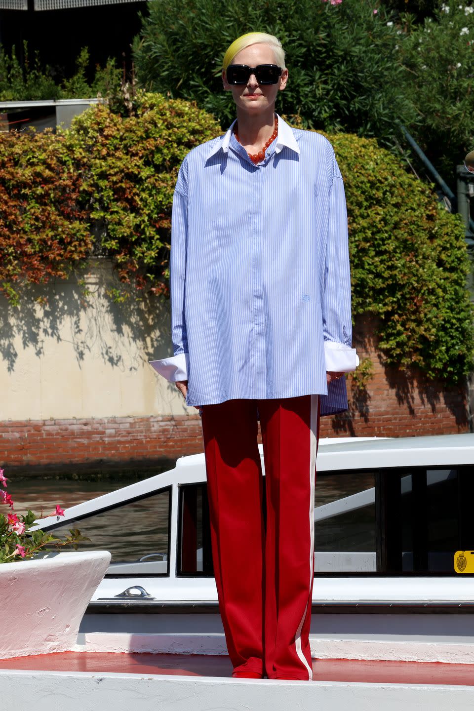 <p>Wearing an oversized Loewe shirt.</p>