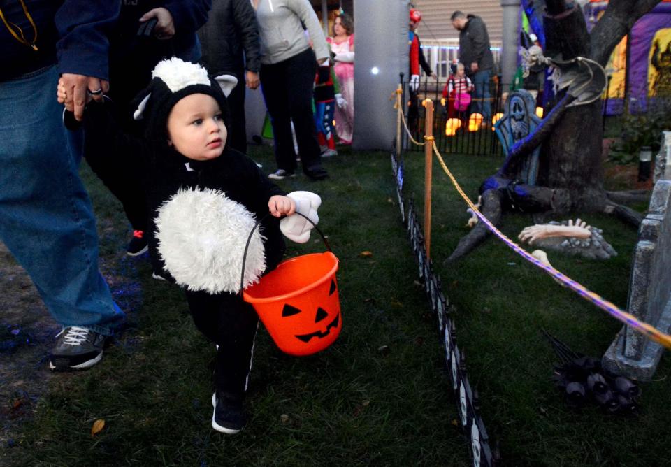 Children tour a Halloween display at the Brooklyn home of Ray Gervais in 2017.
