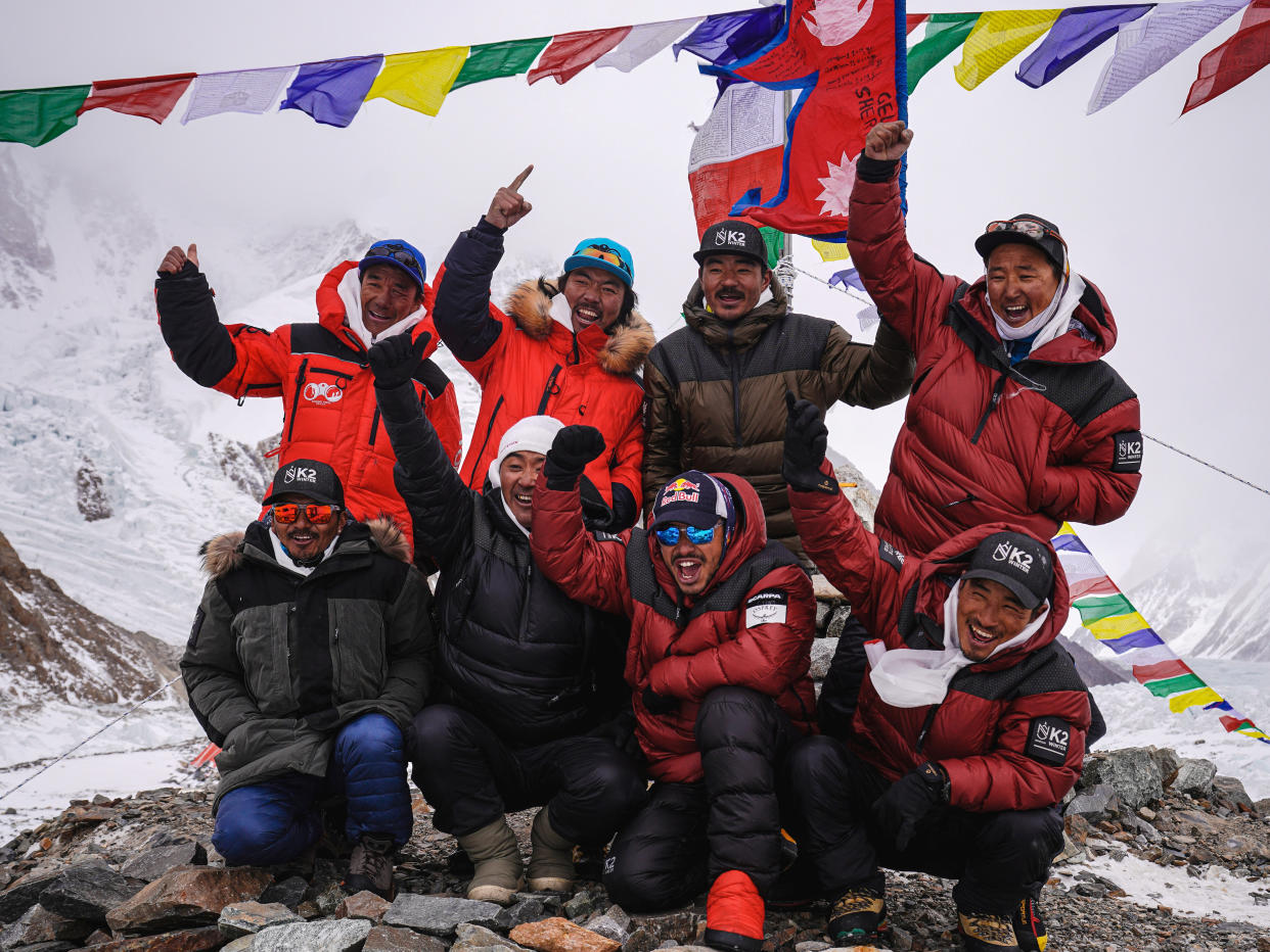 <p>Nirmal ‘Nims’ Purja (centre, second from right), one of the climbers, is pictured on 5 January during the Puja ceremony before successfully attempting to climb K2</p> (Nimsdai/Red Bull Content Poolim)