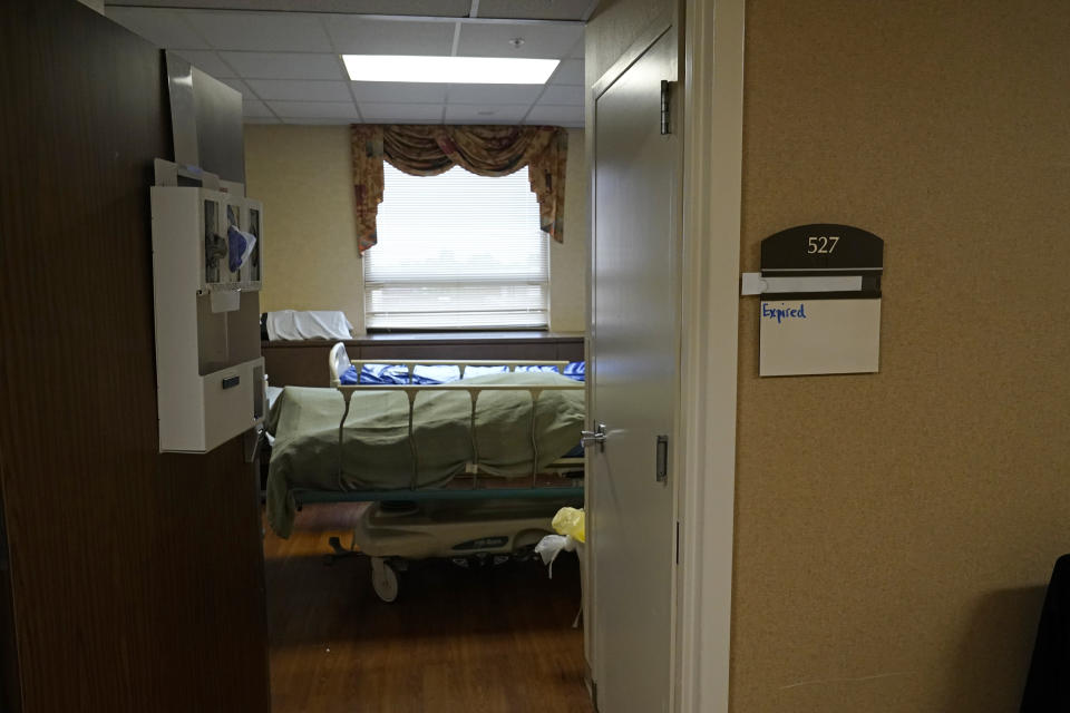 The body of a COVID-19 patient who died sits in a hospital room shortly after death, at the Willis-Knighton Medical Center in Shreveport, La., Wednesday, Aug. 18, 2021. (AP Photo/Gerald Herbert)