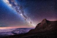 <p>The Milky Way over the peak of Mount Kinabalu in Malaysia. (Photo: Grey Chow/Caters News) </p>