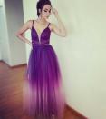 <p>La presentadora llegó con este vestido morado con escote V y falda de tul. </p>