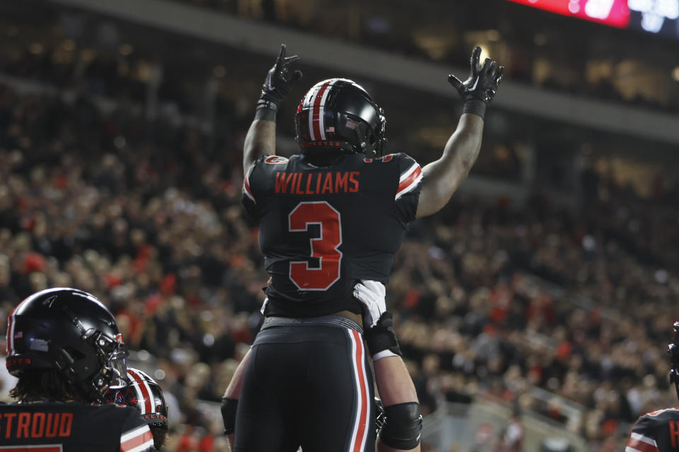 Ohio State running back Miyan Williams celebrates after his touchdown against Wisconsin during the first half of an NCAA college football game Saturday, Sept. 24, 2022, in Columbus, Ohio. (AP Photo/Jay LaPrete)