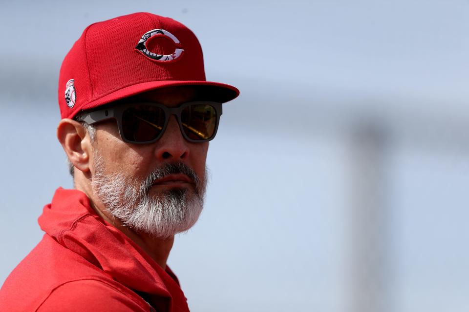 Cincinnati Reds hitting coach Alan Zinter (59) observes live batting practice during spring practice, Friday, Feb. 21, 2020, at the baseball team's spring training facility in Goodyear, Ariz. 