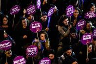 <p>Protesters hold placards as they march during a demonstration to mark the International Day for the Elimination of Violence Against Women in Istanbul, Turkey, on Nov. 25, 2017. (Photo: Yasin Akgul/AFP/Getty Images) </p>