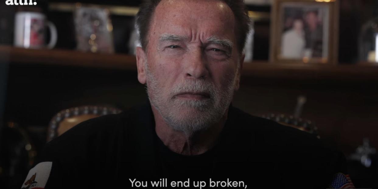 A still from a YouTube video by Arnold Schwarzenegger uploaded on March 7 2023, showing a head-and-shoulders shot of the former governor in an office. The subtitles read: "You will end up broken."