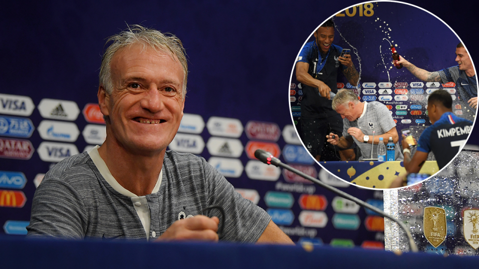 The french players sprayed champagne over Didier Deschamps in the post-match press conference. Pic: Getty