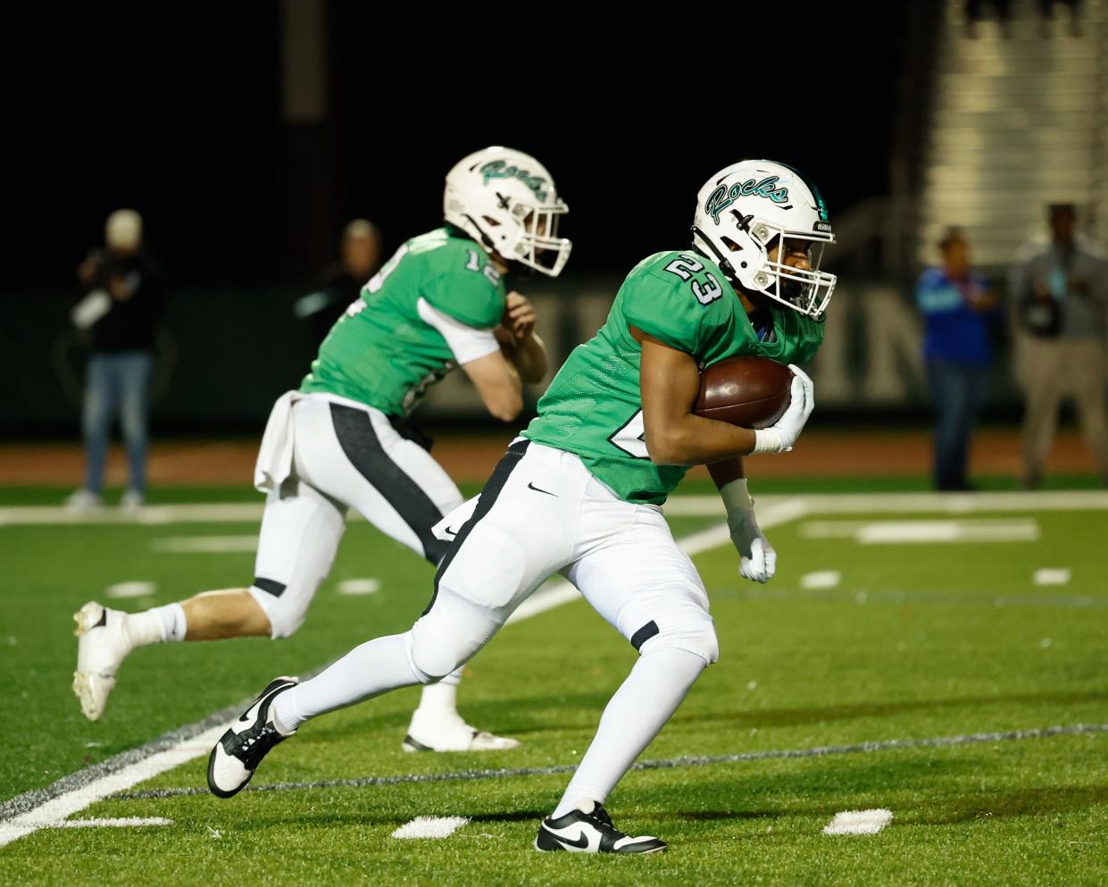 Dublin Coffman’s Daven White carries the ball during Friday's win over Olentangy Liberty.