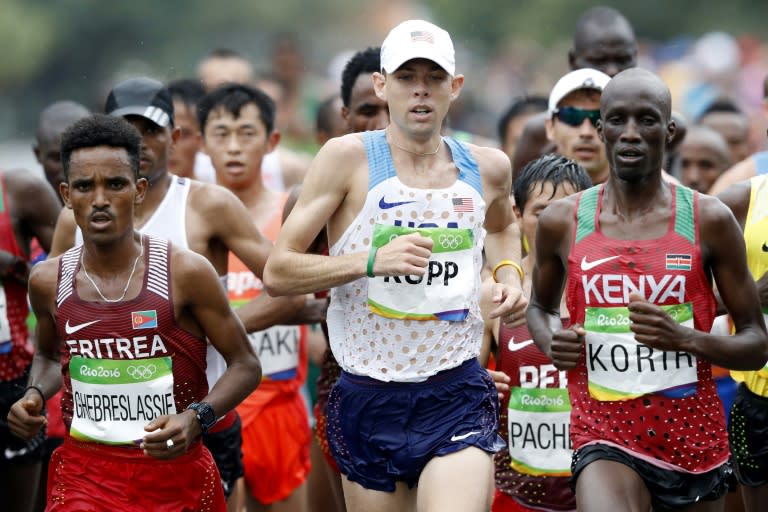 US Galen Rupp (C) and Kenya's Wesley Kipchumba Korir (R), pictured in August 2016, are just two of the men looking to dethrone last year's winner Berhanu Hayle