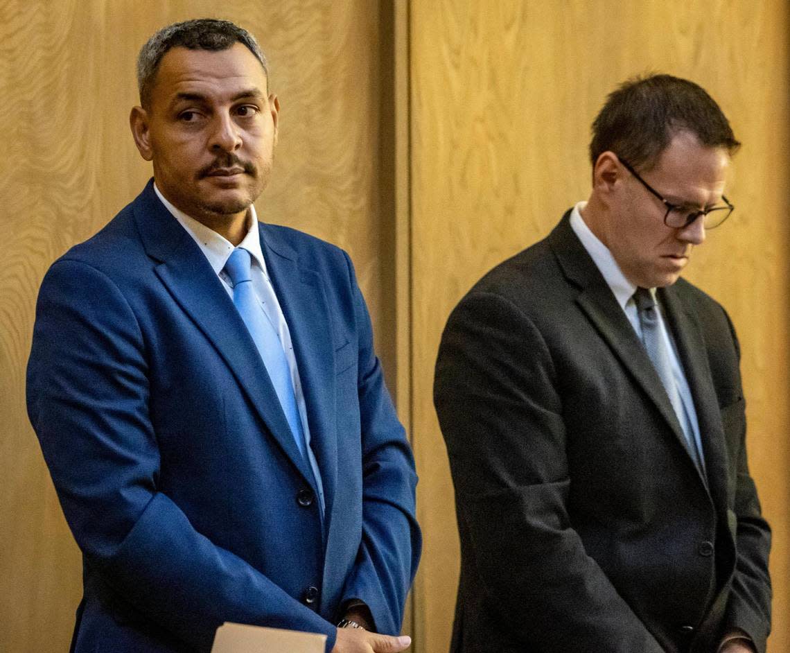 Eduardo Acosta, left, in the courtroom at Miami Dade Criminal Court with his attorney Eric Matheny during jury selection on Oct. 11, 2022. Acosta, a Trump follower, is standing trial for attempted murder for allegedly shooting at a man who had a Biden flag on his Jet Ski on Election Day 2020.