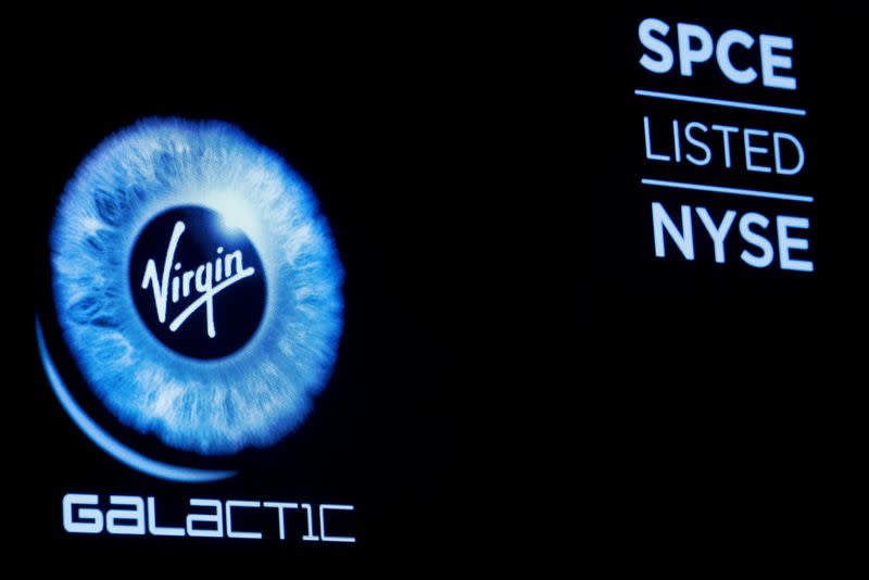 FILE PHOTO: Virgin Galactic (SPCE) logo is displayed on a screen on the floor of the NYSE in New York