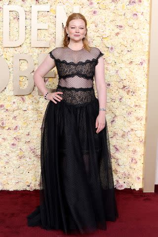 <p>Monica Schipper/GA/The Hollywood Reporter via Getty</p> Sarah Snook at the Golden Globes 2024