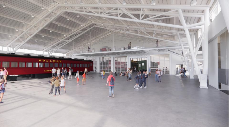 A rendering of the National Railroad Museum's new expansion which includes indoor space for 4 train cars, event space for 200 people, a classroom and outdoor space.