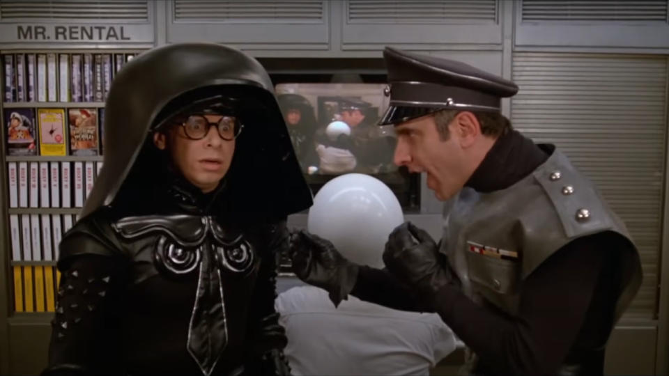 George Winer explains Instant Cassettes to a confused Rick Moranis in Spaceballs.