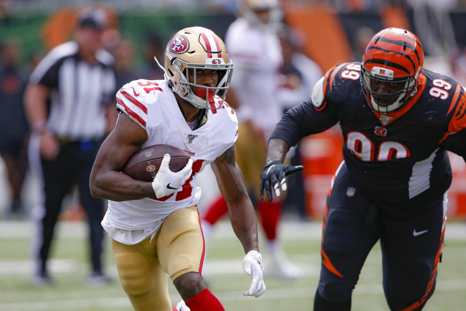 San Francisco 49ers running back Raheem Mostert (31) runs the ball past Cincinnati Bengals defensive tackle Andrew Billings (99) during the second half an NFL football game, Sunday, Sept. 15, 2019, in Cincinnati. (AP Photo/Gary Landers)