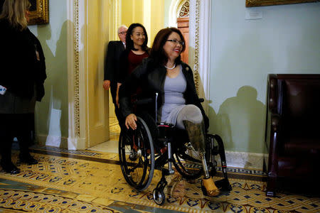 U.S. Senator-elect Tammy Duckworth (D-IL) arrives for Senate Democratic party leadership elections at the U.S. Capitol in Washington, DC, U.S. November 16, 2016. REUTERS/Jonathan Ernst