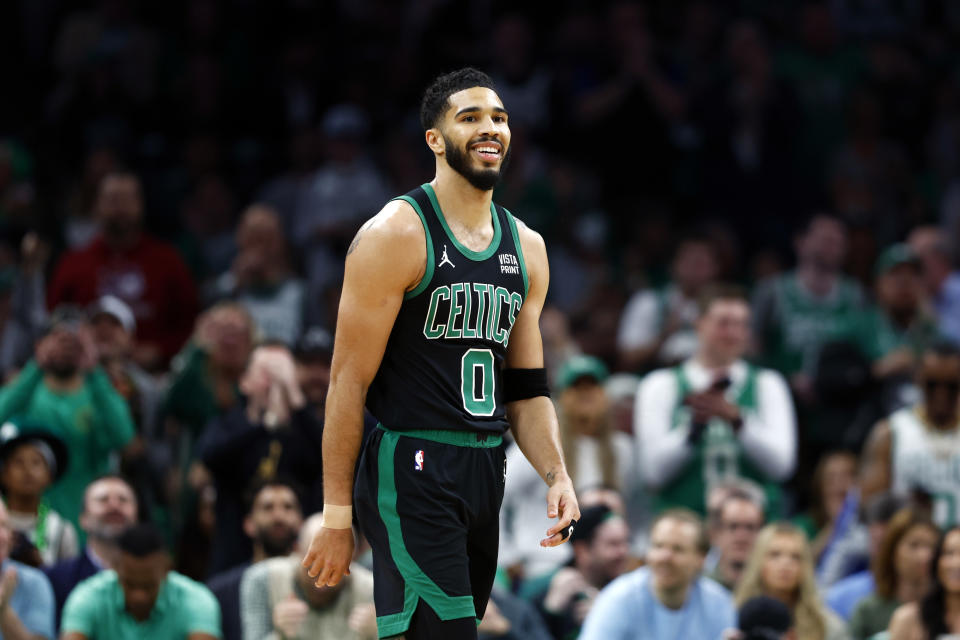 Jayson Tatum and the Celtics are favored to win the NBA Championship.  (Photo by Danielle Parhizkaran/The Boston Globe via Getty Images)