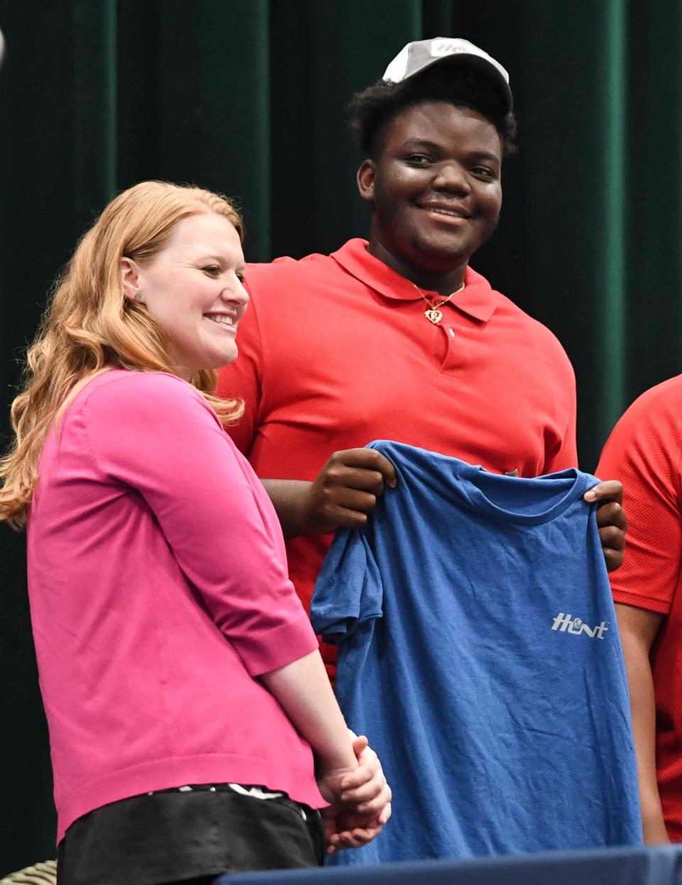 May 9 2024; Tuscaloosa, AL, USA; Kavaughn Evans signs with Hunt Refining during the Signing Day for students entering the workforce through the West Alabama Works program at Shelton State.