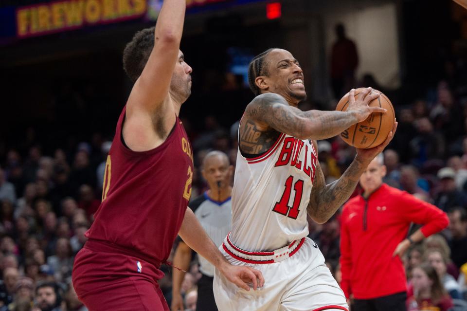 Chicago Bulls' DeMar DeRozan (11) drives against Cleveland Cavaliers' Georges Niang during the second half Wednesday in Cleveland.