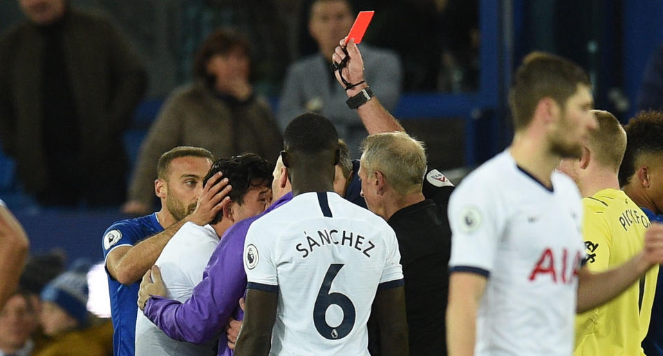 Son Heung-min is shown a red card for his tackle on Andre Gomes. (Credit: Getty Images)