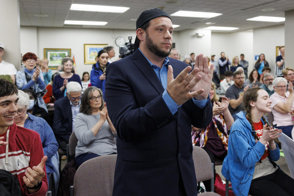 FILE - Mark Lee Dickson, a Texas pastor and anti-abortion activist, claps as members of the city council voted to approve an ordinance that would ban the mailing or shipping of abortion pills Tuesday, May 2, 2023 in Danville, Ill. The Illinois city near its eastern border with Indiana on Tuesday banned the mailing or shipping of abortion pills, defying the state's Democratic attorney general and the American Civil Liberties Union who have repeatedly warned that the move violates Illinois law's protection of abortion as a fundamental right. (Armando L. Sanchez/Chicago Tribune via AP, File)