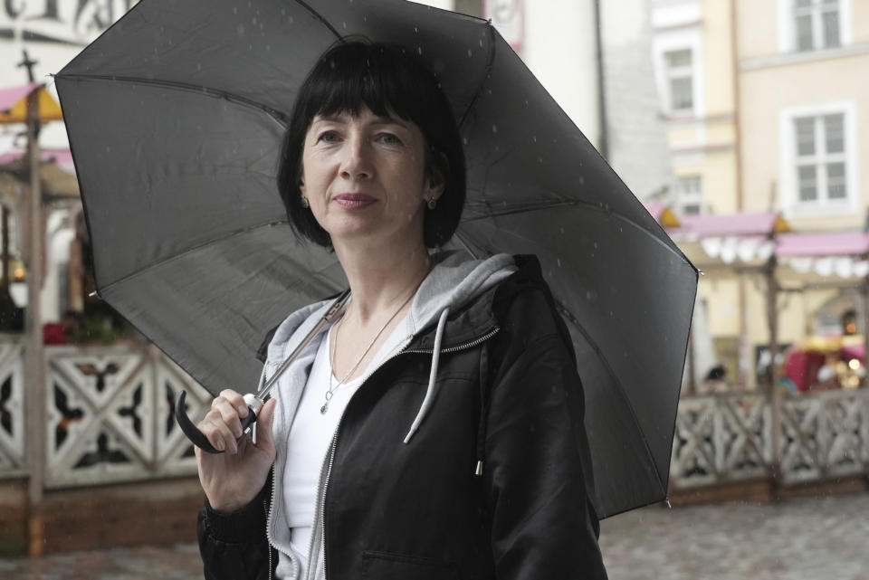 Ukranian refugee Viktoria Kovalevska poses for a photo in Tallinn, Estonia, Saturday, June 18, 2022. Kovalevska was evacuated from Mariupol with her husband and two daughters. The family tapped into the network of Russian volunteers to leave for Estonia, where they now live in Tallinn. (AP Photo/Vasilisa Stepanenko)