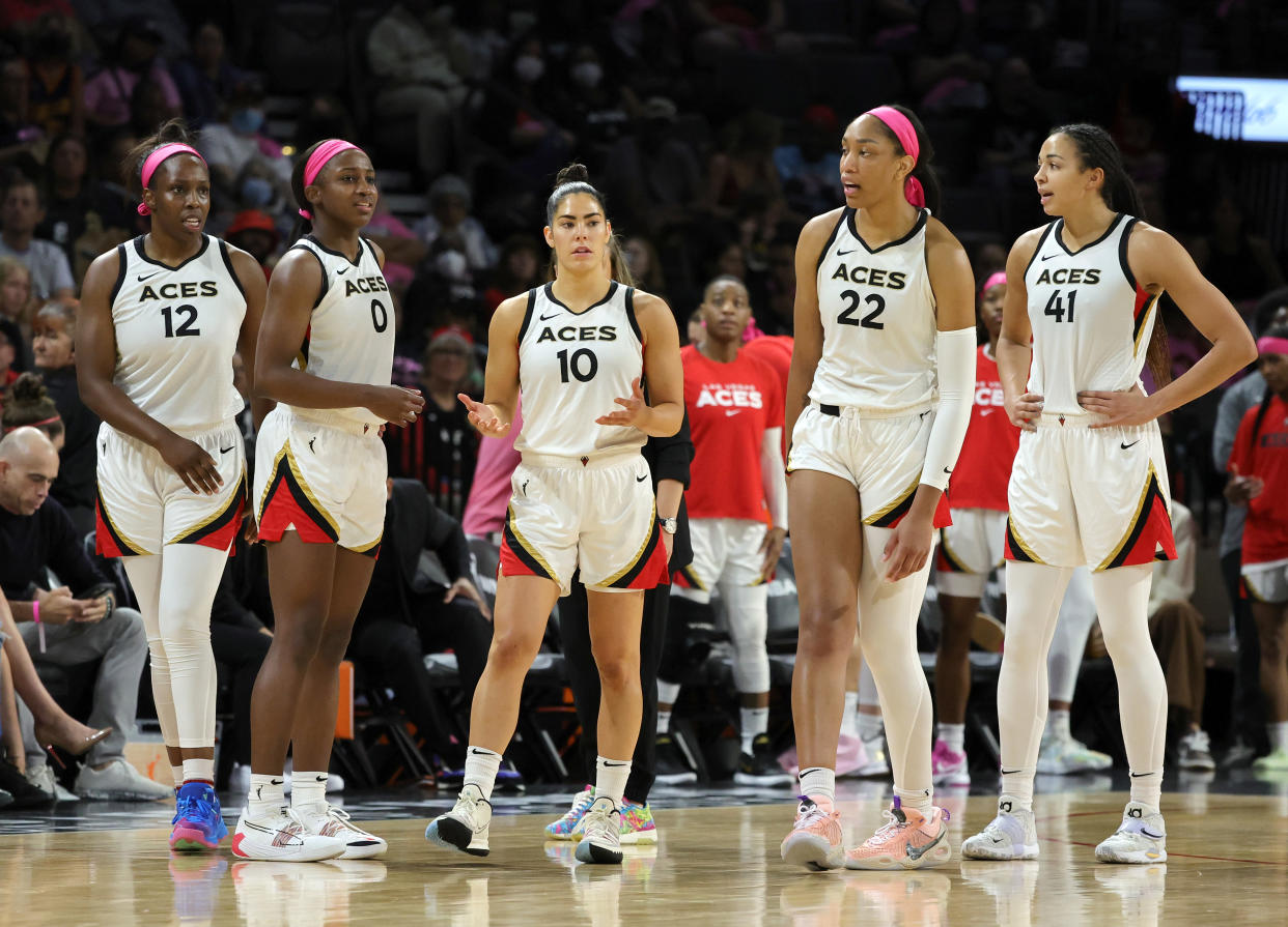 Chelsea Gray #12, Jackie Young #0, Kelsey Plum #10, A'ja Wilson #22 and Kiah Stokes #41 of the Las Vegas Aces walk back on the court after a timeout in their game against the Chicago Sky at Michelob ULTRA Arena on August 11, 2022 in Las Vegas, Nevada. The Aces defeated the Sky 89-78. NOTE TO USER: User expressly acknowledges and agrees that, by downloading and or using this photograph, User is consenting to the terms and conditions of the Getty Images License Agreement. (Photo by Ethan Miller/Getty Images)