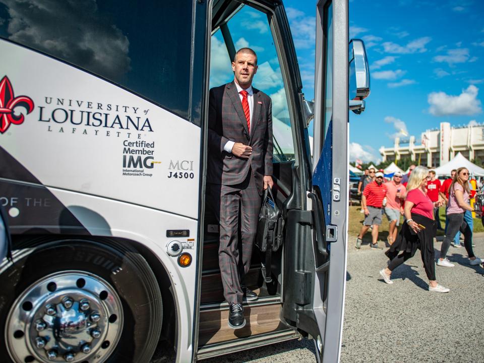 Billy Napier gets off the bus for his final game as coach of the Louisiana Ragin' Cajuns. UL beat App State 24-16 Saturday in the Sun Belt Conference championship game at Cajun Field.