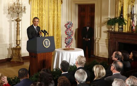 U.S. President Barack Obama talks about investments to improve health and treat disease through precision medicine while in the East Room of the White House in Washington January 30, 2015. REUTERS/Larry Downing