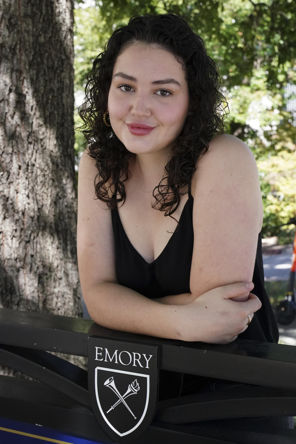 Helen Khuri poses for a portrait on the campus of Emory University Thursday, Oct. 6, 2022, in Atlanta. Khuri’s mother found a specialist to help her when the 19-year-old’s post-traumatic stress disorder flared up last spring. But the Emory University student had to temporarily move from Atlanta to Boston for treatment, even though she never set foot inside the hospital offering it. “It didn’t necessarily make sense to … kind of uproot my life, just to receive this three-week treatment program,” Khuri said. (AP Photo/John Bazemore)