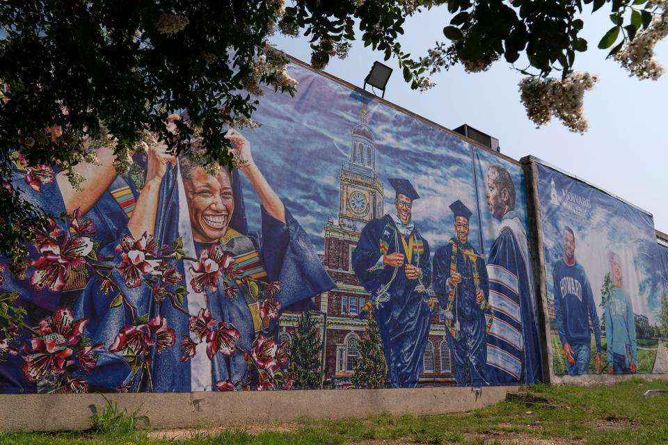 A graduation themed printed mural is seen on the Howard University campus, July 6, 2021, in Washington. More than a third of America's 101 historically Black colleges and universities have been targeted by calls or emails threatening bombings since early January. Howard University in Washington has received at least four threats since Jan. 4.