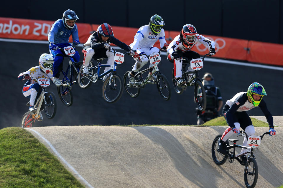 LONDON, ENGLAND - AUGUST 09: Nicholas Long (R) of the United States leads the field down a jump during the Men's BMX Cycling Quarter Finals on Day 13 of the London 2012 Olympic Games at BMX Track on August 9, 2012 in London, England. (Photo by Phil Walter/Getty Images)