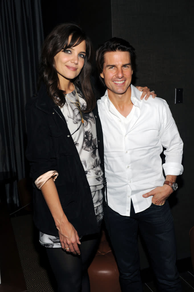 Actors Katie Holmes (L) and Tom Cruise attend The Cinema Society's The Romantics screening party at Gansevoort Park Avenue. (Photo by Steve Eichner/WWD/Penske Media via Getty Images)