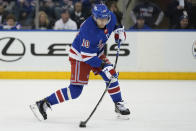 New York Rangers' Artemi Panarin shoots during the first period in Game 1 of an NHL hockey Stanley Cup first-round playoff series against the Washington Capitals, Sunday, April 21, 2024, in New York. (AP Photo/Seth Wenig)