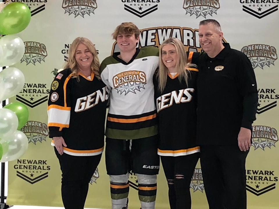 Newark's Trey Robinson, with his family, was honored on Senior Night for the Newark Generals on Thursday at Reese Ice Arena.