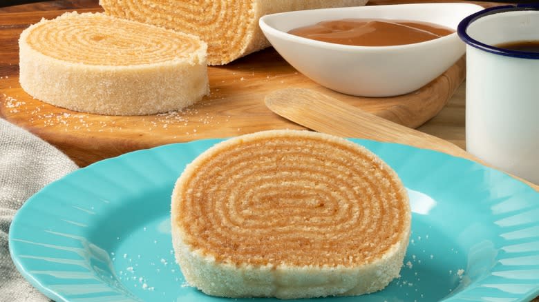 Slices of bolo de rolo on table