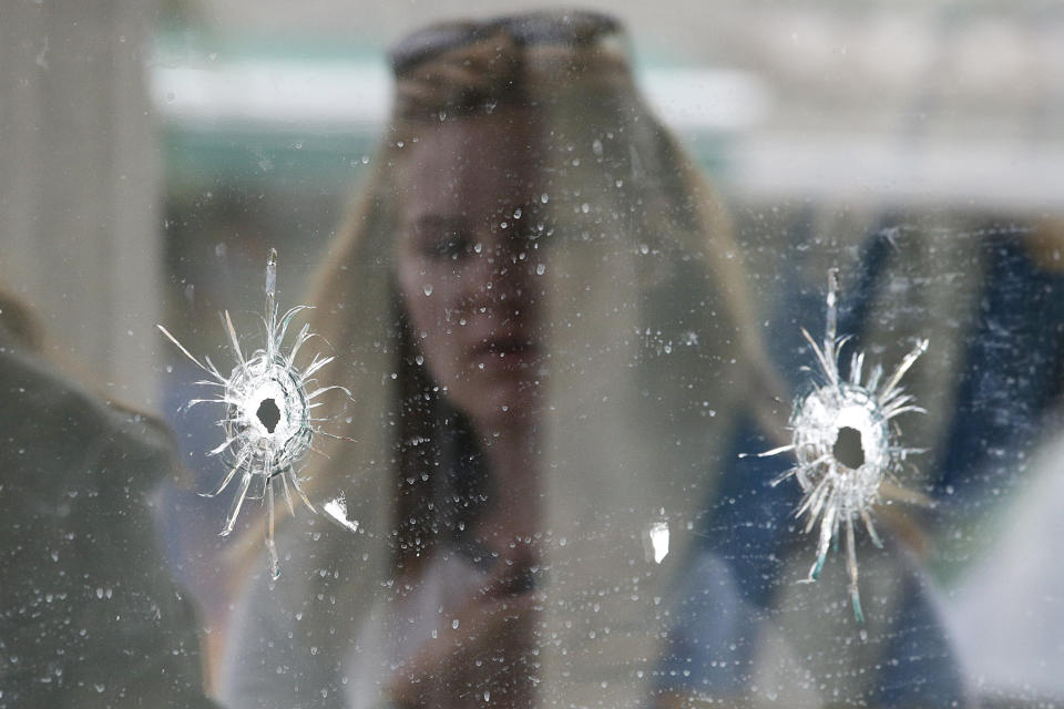 Bullet holes where a mass shooting took place near the University of California, Santa Barbara, campus