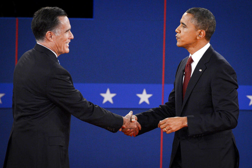 Barack Obama and Mitt Romney shake hands.  (Timothy A. Clary/AFP via Getty Images file)