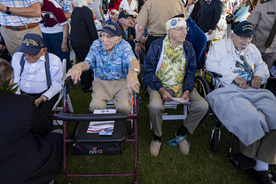 From left to right, Pearl Harbor survivors Harry Chandler, Ken Stevens, Herb Elfring and Ira "Ike" Schab during the 82nd Pearl Harbor Remembrance Day ceremony on Thursday, Dec. 7, 2023, at Pearl Harbor in Honolulu, Hawaii. (AP Photo/Mengshin Lin)